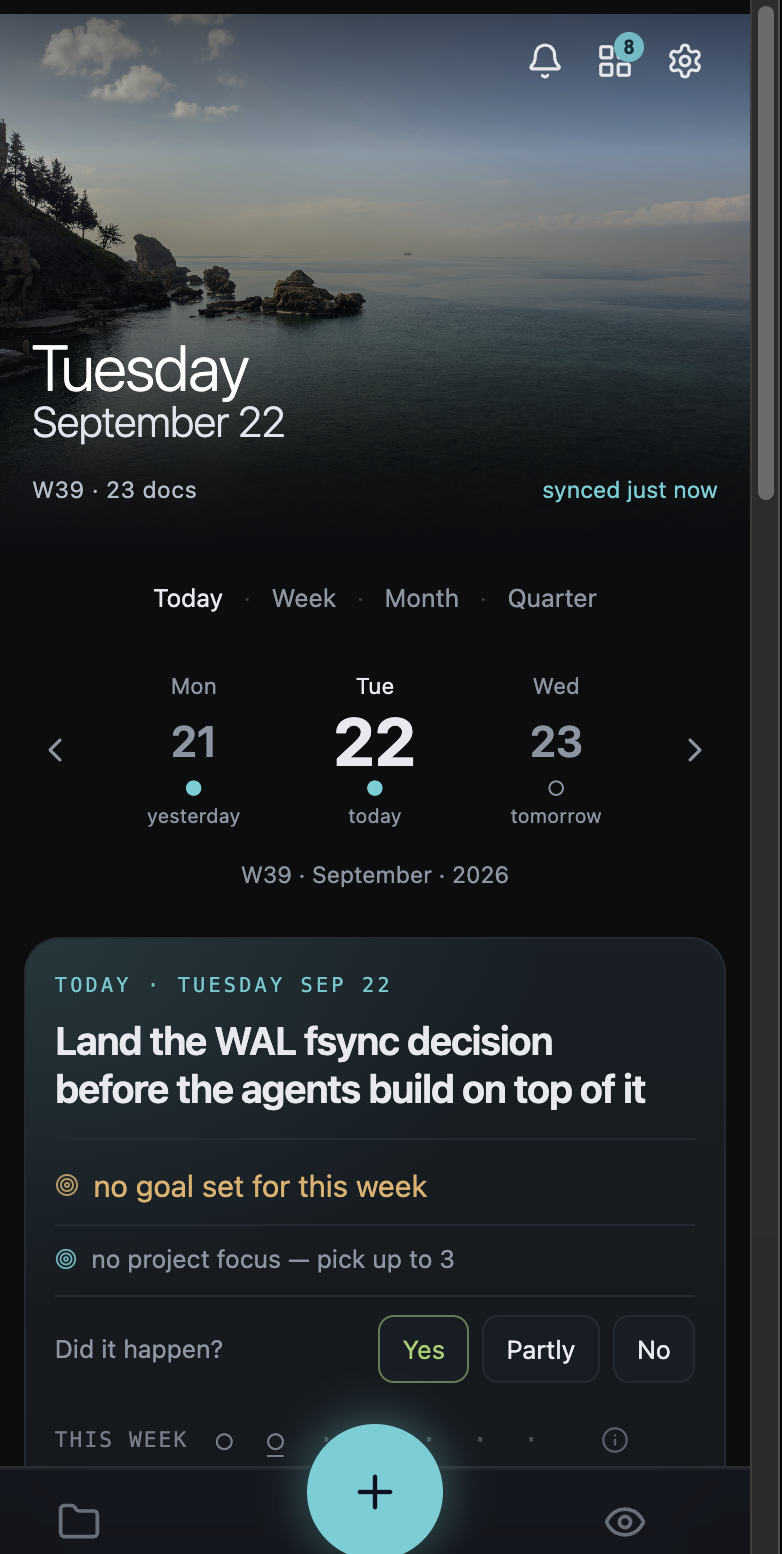 Collab's home screen on a phone: a photograph, the date, and today's intent